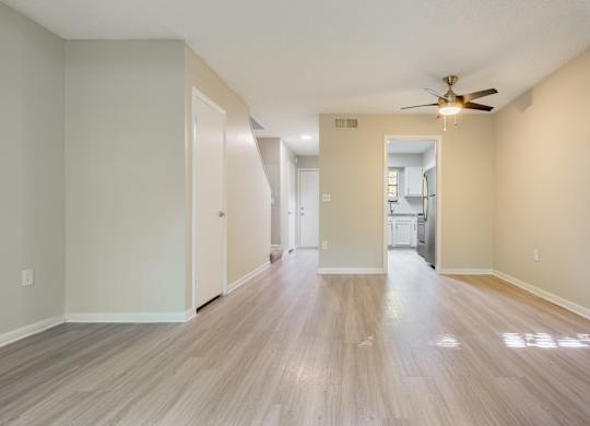 A room with a ceiling fan and light fixture. at Rosen at North Hills, Raleigh, 27609
