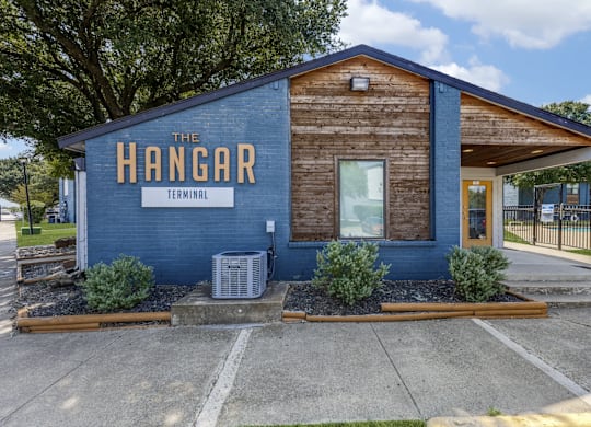 A blue building with the words