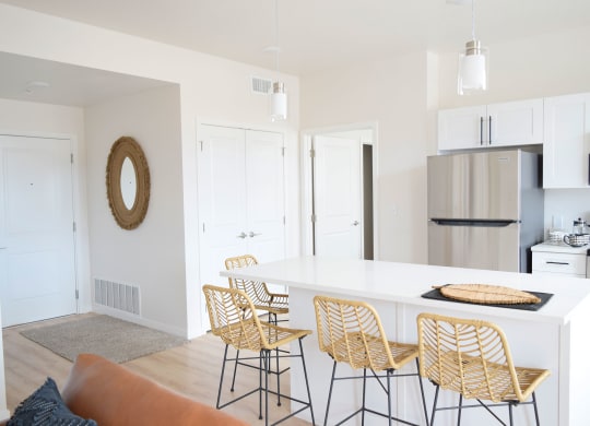 a view of the kitchen and living room from the living room