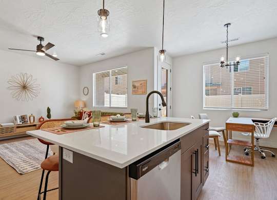 a kitchen with a large island in the middle of it