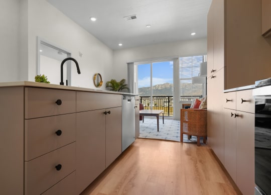 a kitchen with hardwood floors