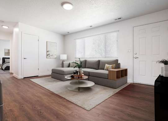 a living room with a couch and a coffee table