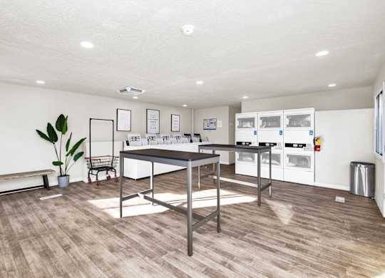 A kitchen with a table and chairs in the middle of the room.