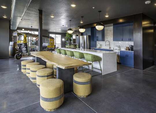 a dining room with a table and chairs