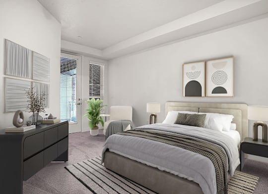 A bedroom with a large bed, a nightstand, and a plant.