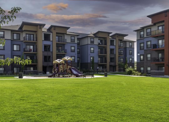 a playground at the flats at big tex apartments in san antonio, tx
