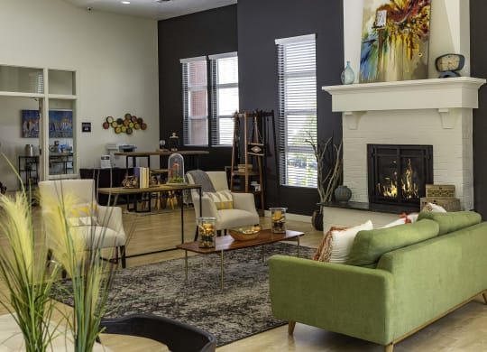 a living room filled with furniture and a fire place