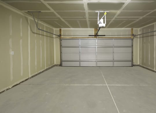 two car attached garage at VALO at South Haven Farms townhomes in Payson, UT