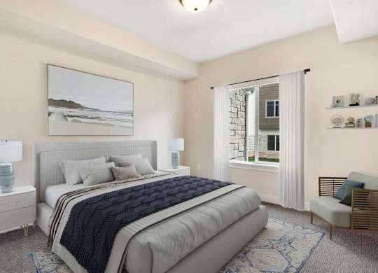 A bedroom with a large bed and a painting on the wall.