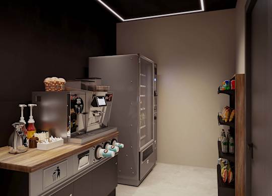 A modern kitchen with a refrigerator, oven, and sink.