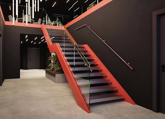 A red staircase with a planter box at the bottom.