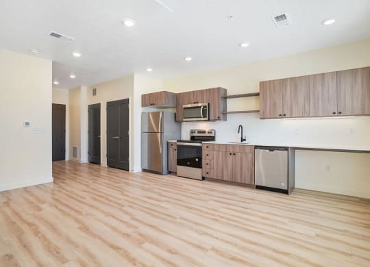 a large empty kitchen and living area