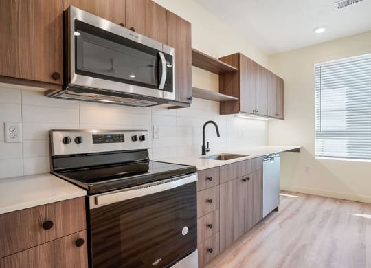 a kitchen with stainless steel appliances