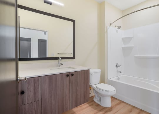 a modern bathroom with white shleves