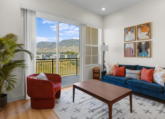 a furnished living room with sliding glass doors