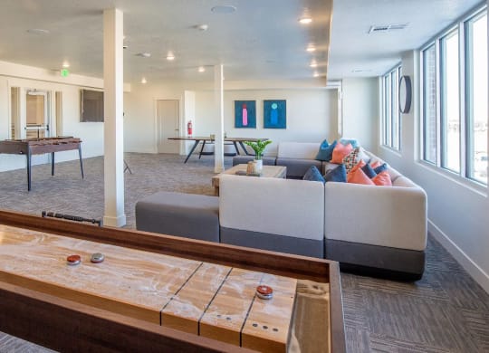 The Arlo | Game room with shuffle board, table tennis, foosball, and more