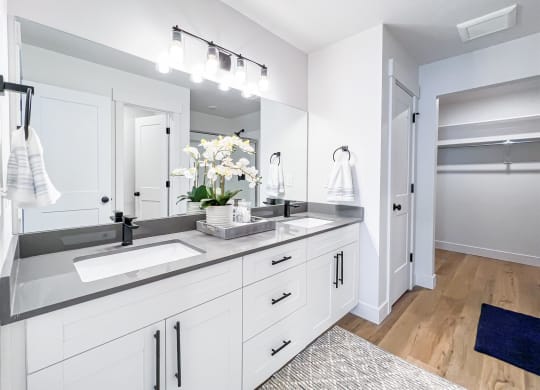 bathroom with double vanity at Crestview at Highland townhomes in Highland, UT