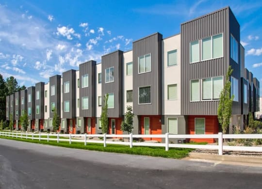 an image of a row of new apartment buildings