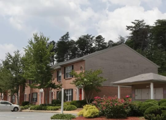 a building with a car parked in front of it at Brookside Pointe, Travelers Rest, South Carolina
