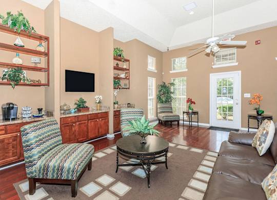 Living Room With Oversized Windows And Doors at Cross Creek Apartments, Beaufort, SC