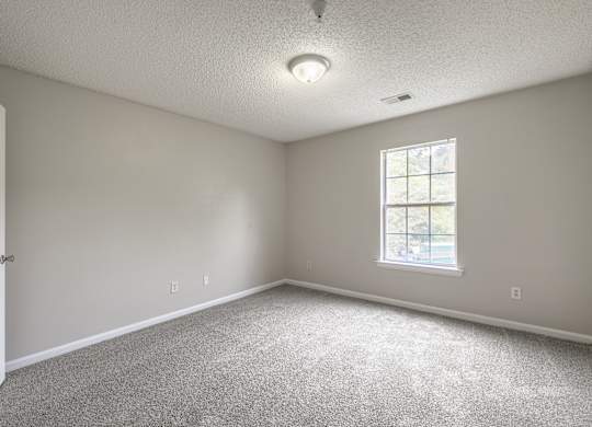 Bedroom With Plenty Of Natural Lights at Cross Creek Apartments, Beaufort, SC