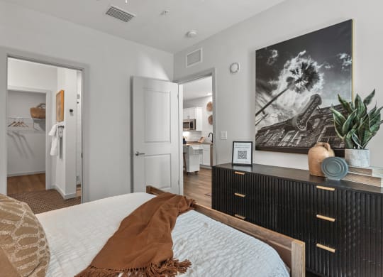 a bedroom with a bed and a dresser at Casa Marti, Florida, 33605