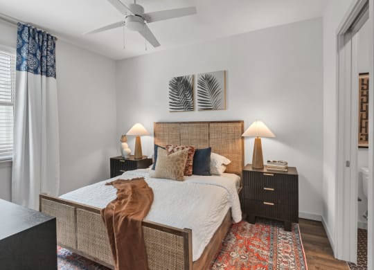a bedroom with a bed and a ceiling fan at Casa Marti, 33605