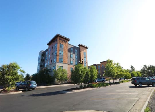 an empty parking lot in front of an apartment building at Bluestone Lofts, Minnesota