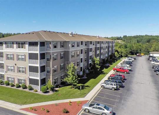 an aerial view of an apartment building in a parking lot at Boulder Ridge, Minnesota