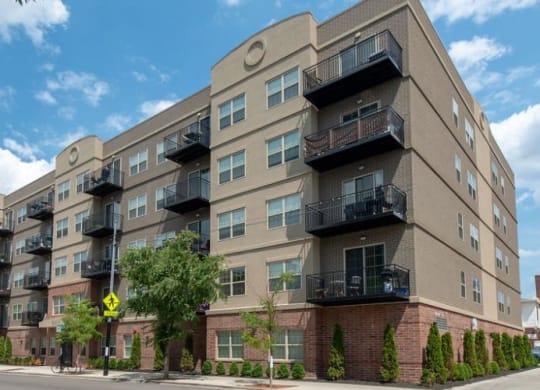 a large apartment building on the corner of a street  at Kedzie 4447, Chicago, IL