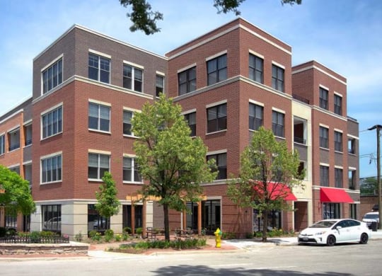 a large brick building on the corner of a street at Clarendon Hills 229, Clarendon, 60514