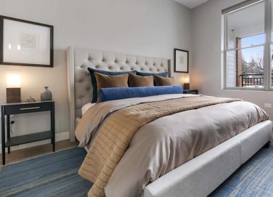 a bedroom with a bed and a large window at Clarendon Hills 229, Clarendon Illinois