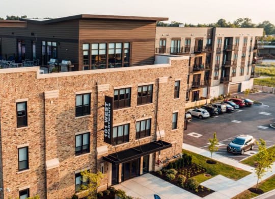an aerial view of a building with cars parked in a parking lot at Barrington 101, Barrington, IL 60010