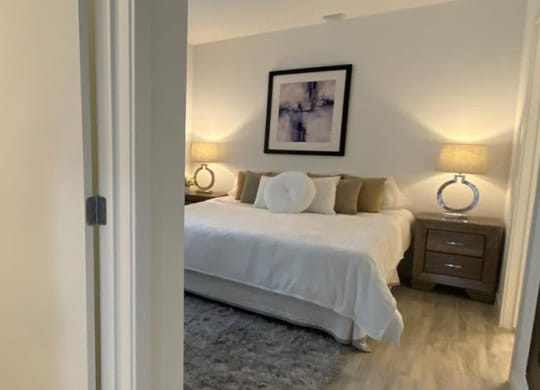 a bedroom with a bed and a closet at Highwood 546, Illinois