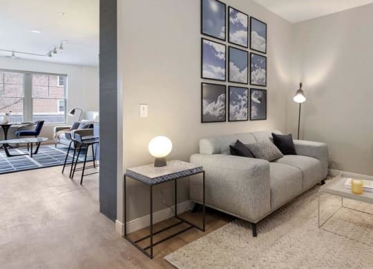 a living room with a couch and a table at Clarendon Hills 229, Illinois