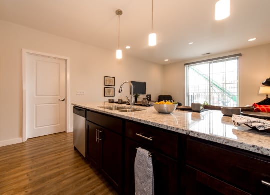 a kitchen with a counter top and a sink