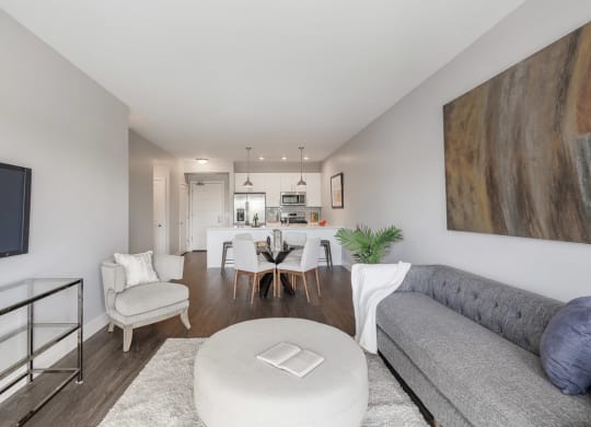 a living room with a couch and a table at Barrington 101, Barrington, IL