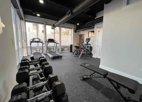 a gym with free weights and machines 