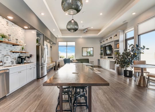 a large kitchen and dining room with a large wooden table at Barrington 101, Barrington Illinois