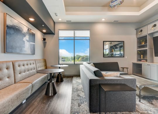 a living room with couches and a window at Barrington 101, Barrington, IL