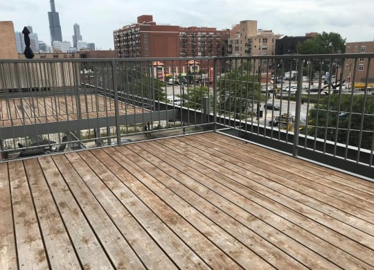 the deck on the top of a roof with a city in the background  at Tripp 4321, Chicago, 60641