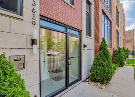 the entrance to a building with glass doors at Montrose 3634, Illinois