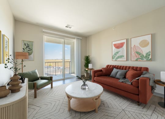 a living room with a red couch and a coffee table
