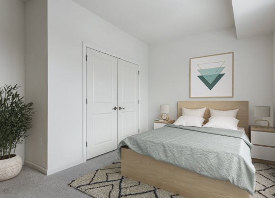 a bedroom with a bed and a painting on the wall
