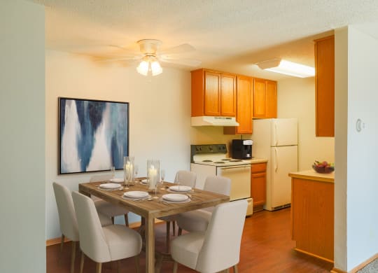 this is a photo of the dining room and kitchen of a 560 square foot 1 bedroom apartment