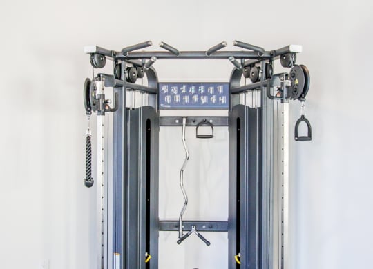 a pair of exercise machines in a room