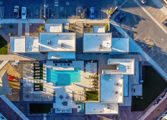 arial view of a building with blue roofs