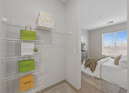 A white shelf with three boxes on it at Copa Flats Apartments, Arizona