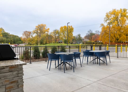 outdoor area with tables and chairs