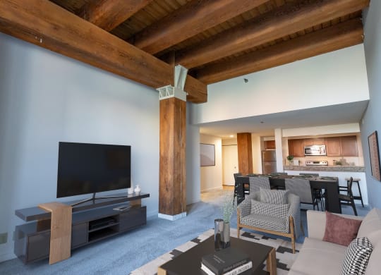 a living room with a couch and a tv